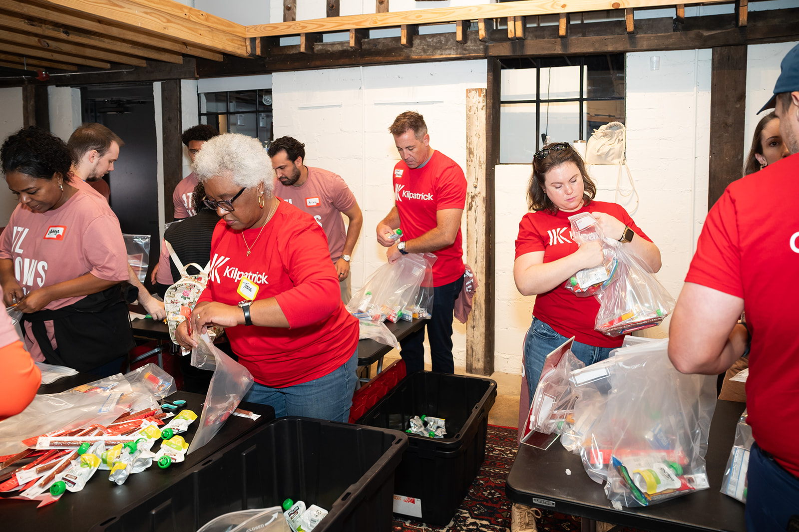 A group of volunteers packing hygiene kits at Hands On Atlanta Week 2026 benefitting 3Keys and Welcome House
