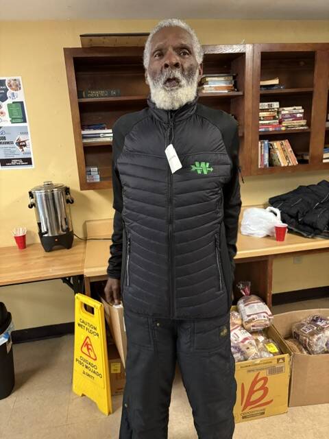 A 3Keys resident of Welcome House in Atlanta tries on his new coat from WSB-TV's Brad Nitz Coat Drive.
