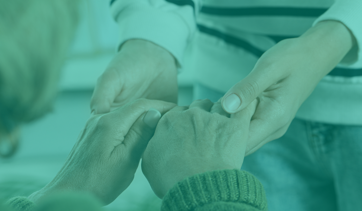 An image of people holding hands