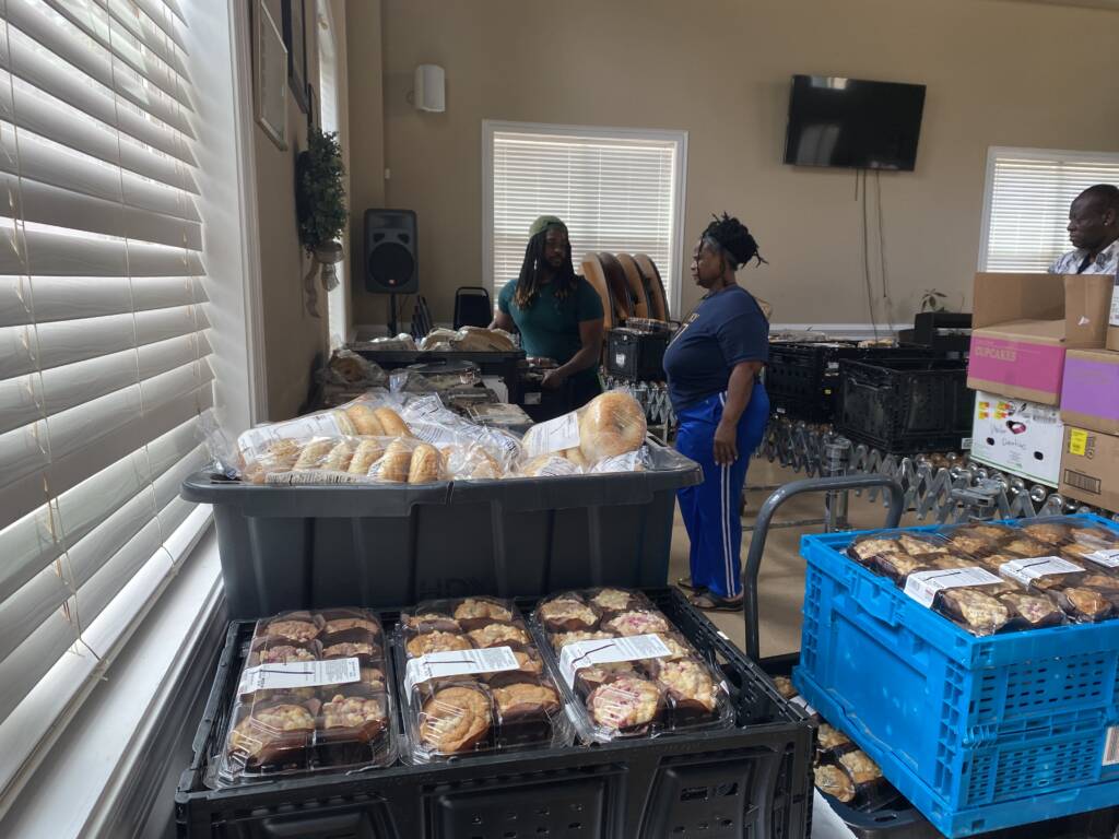 Food is stacked up on carts in the food pantry at the 7th Day Adventist Church in Henry County.