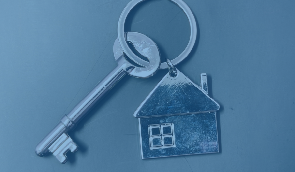 Photo of a house and key