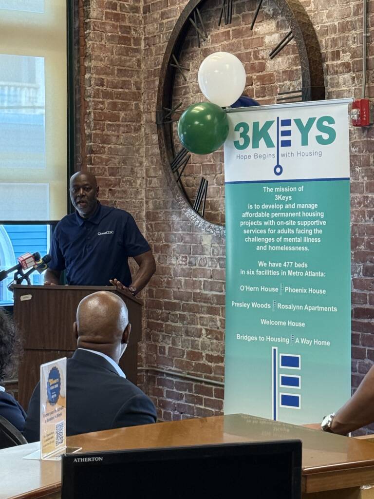 Leonard L. Adams, Jr., CEO of Quest CDC, speaks during the groundbreaking conference at the O'Hern House.