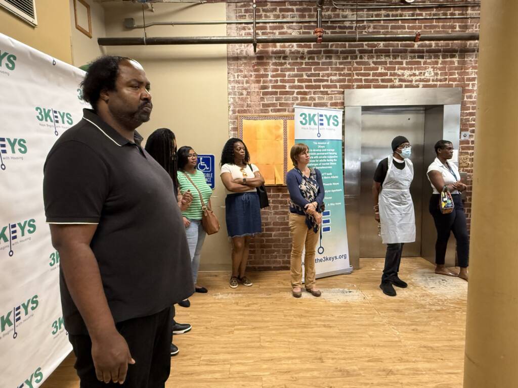 The audience gathered in the lobby of the O'Hern House for the groundbreaking press conference.