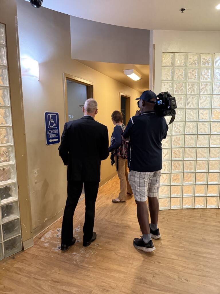 Berndt Petersen and a cameraman with WSB-TV tour one of resident rooms at the O'Hern House ahead of renovations getting underway this month.