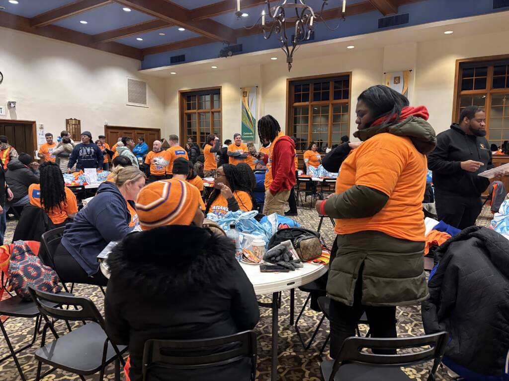 Volunteers get organized around tables for Atlanta's 2026 Point-in-Time Count.
