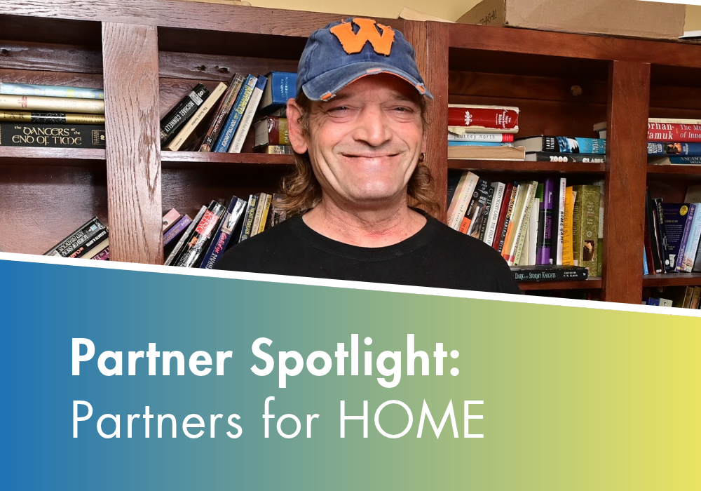 A man smiles at the camera with the text overlaid: 3Keys Partner Spotlight: Partners for HOME